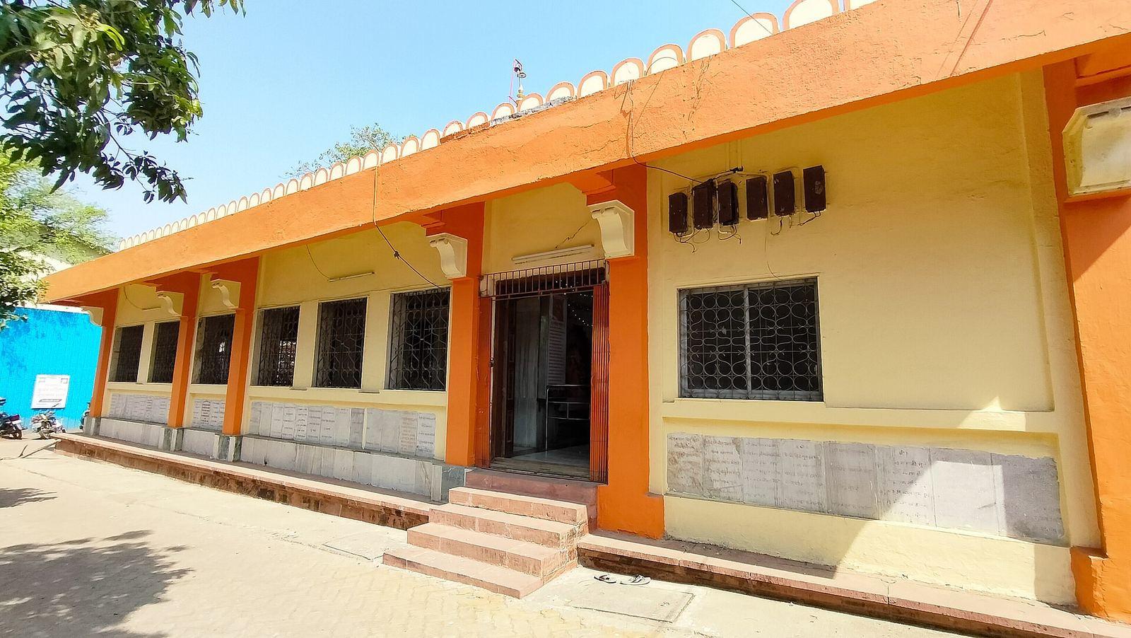 Shri Varadvinayak temple at Mahad, a stone building with a shikhara and a pillared porch