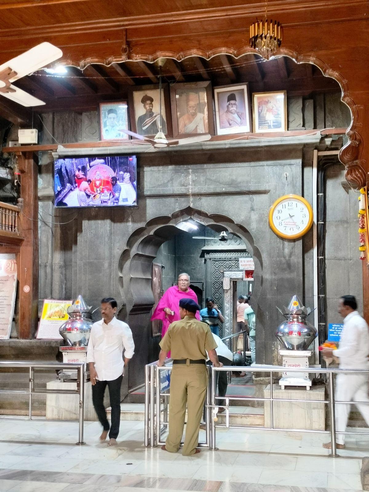 Idol of Shri Ballaleshwar at Pali, crowned and seated in a silver-covered sanctum