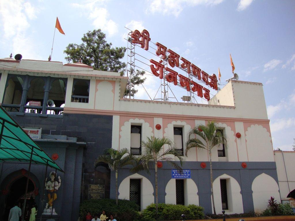 Shri Mahaganapati temple at Ranjangaon, with a carved facade and a Ganesha figure over the entrance